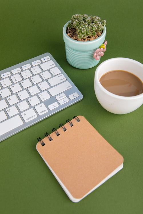 鍵盤記事本辦公用品商務(wù)攝影圖的藝術(shù)與應(yīng)用